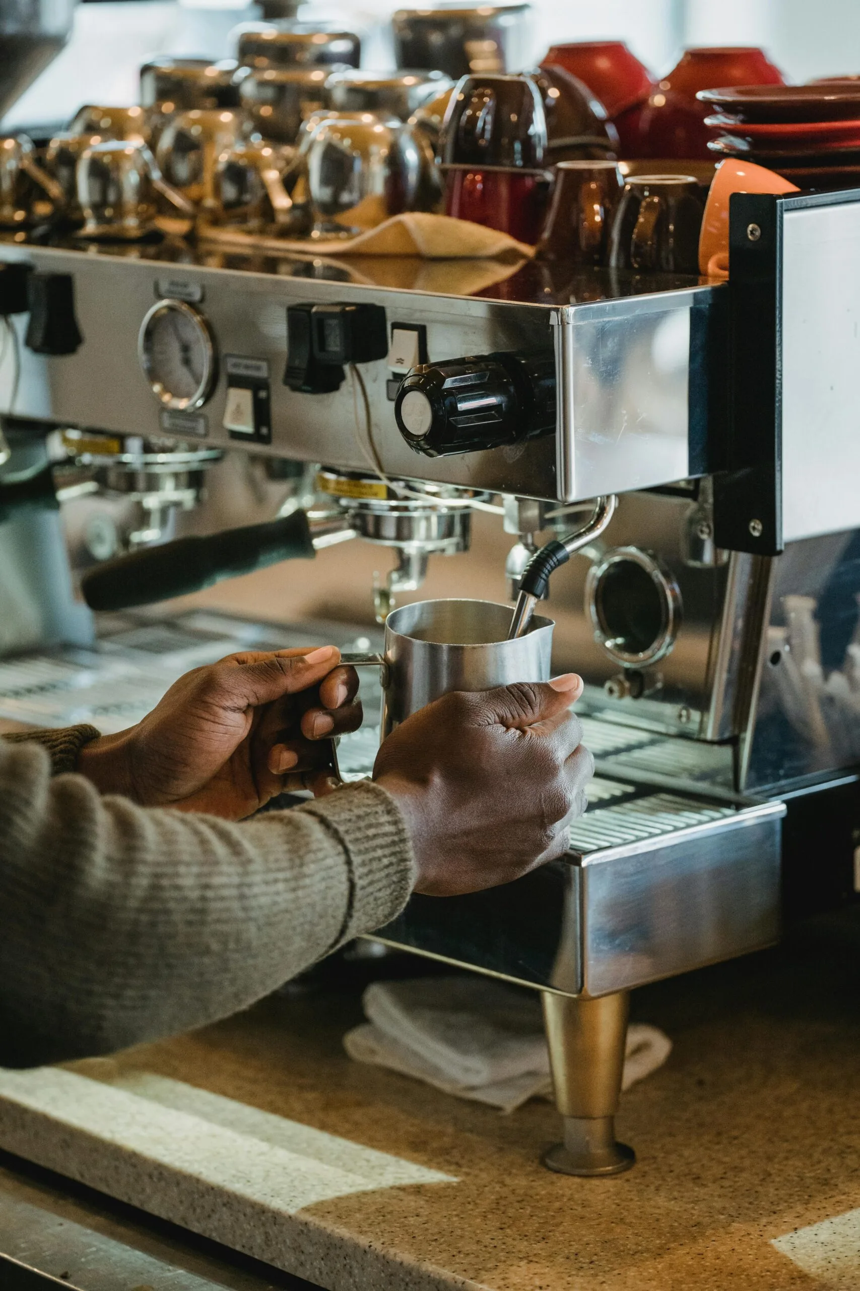 Barista Frothing the Milk